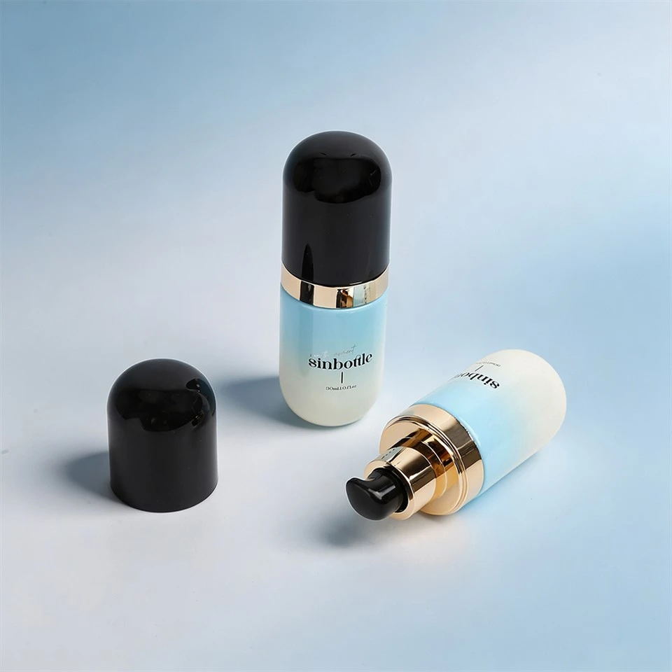 30ml Luxury Capsule Shaped Gradient Blue Glass Foundation Lotion Bottle With Black Cap And Gold Pump