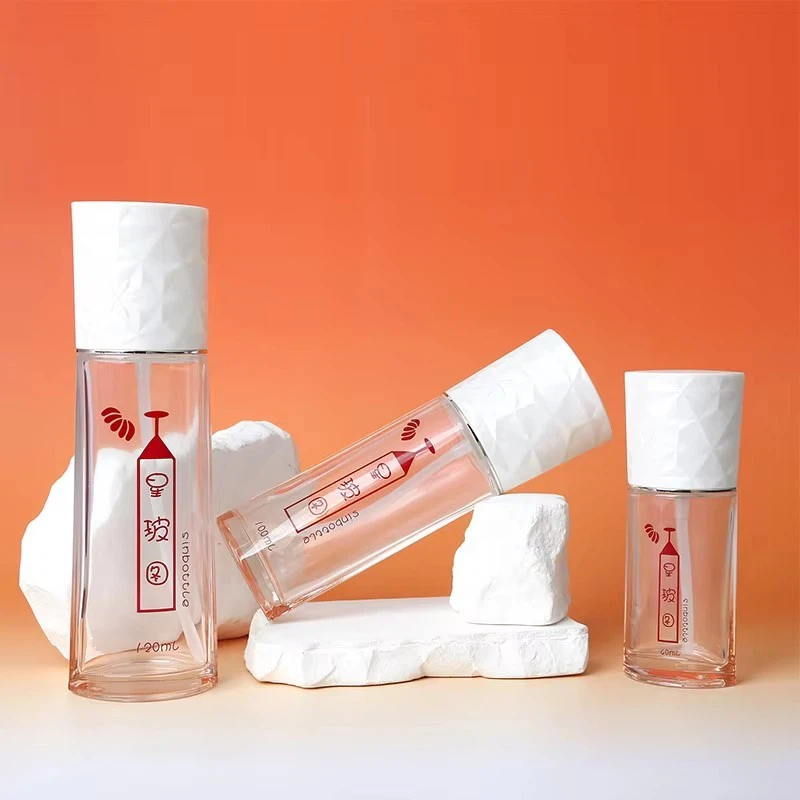 Luxury 50ml 100ml Round Glass Bottles Set For Face Cream Lotion Empty Spray Bottle With Airless Pump Custom Cosmetic Packaging suppliers