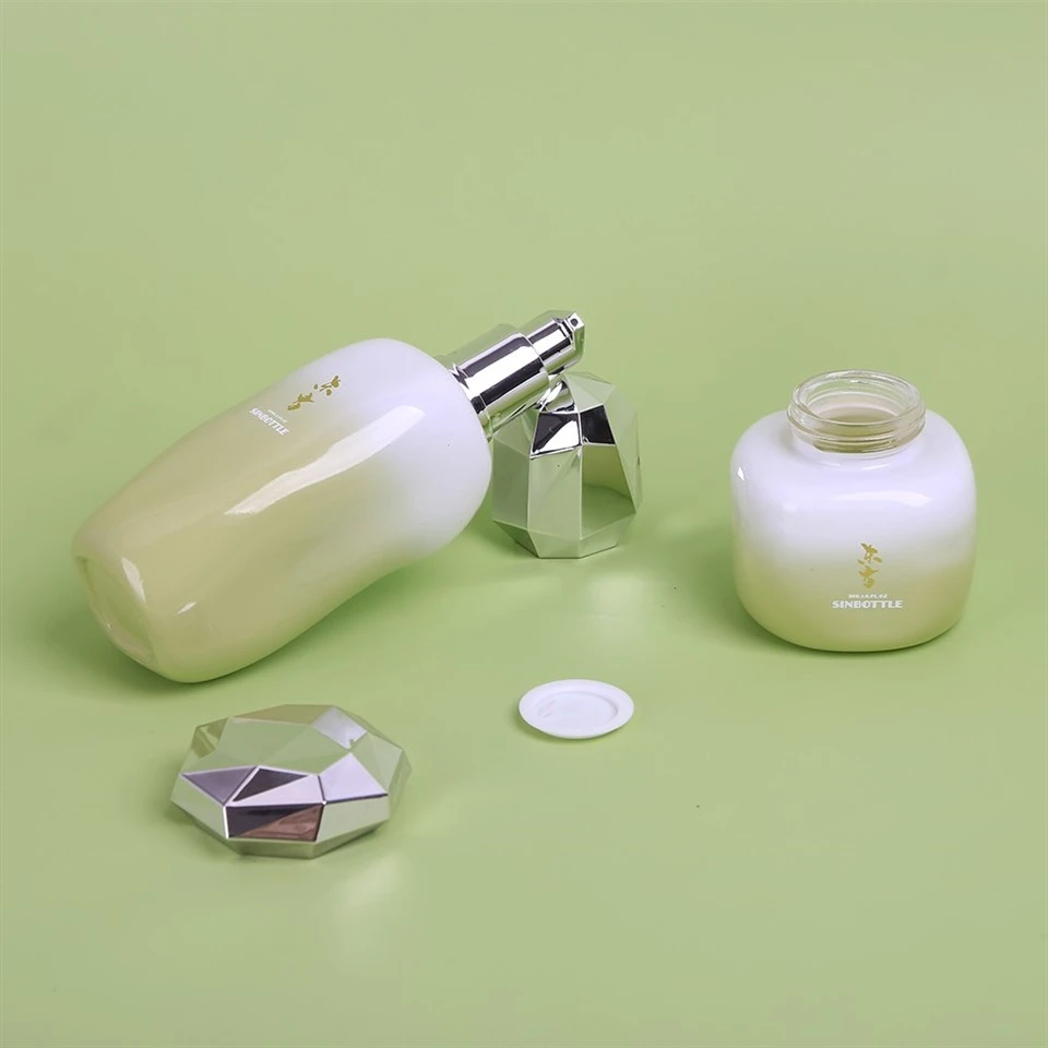 Luxury New Design Cosmetic Packaging Set Glass Bottle With Pump & Glass Cream Jars price