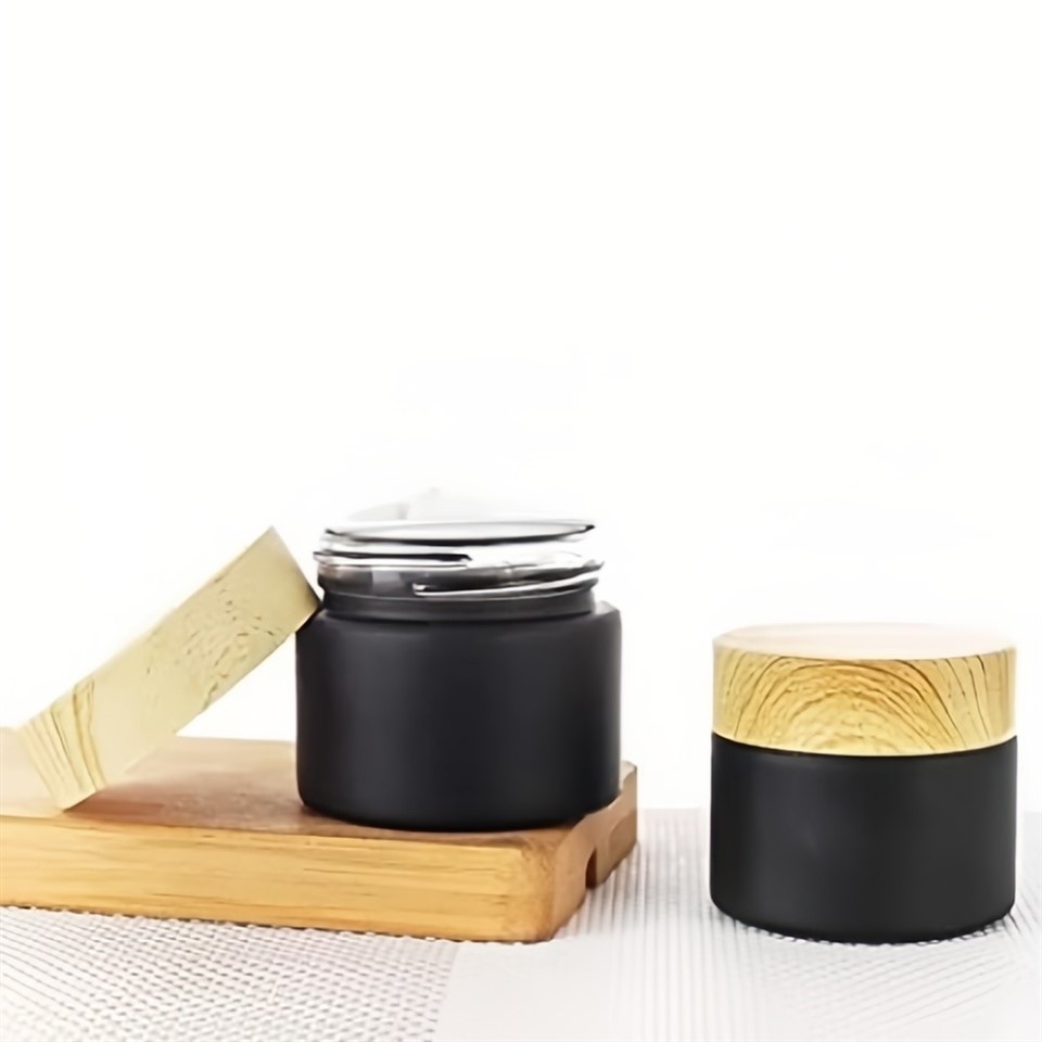 Wholesale Frosted Glass Cosmetic Cream Jars With Natural Bamboo Lids – 5g/15g/30g/50g/100g Sizes For Skincare suppliers