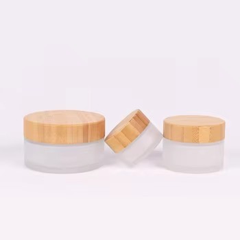 Wholesale Frosted Glass Cosmetic Cream Jars With Natural Bamboo Lids – 5g/15g/30g/50g/100g Sizes For Skincare suppliers